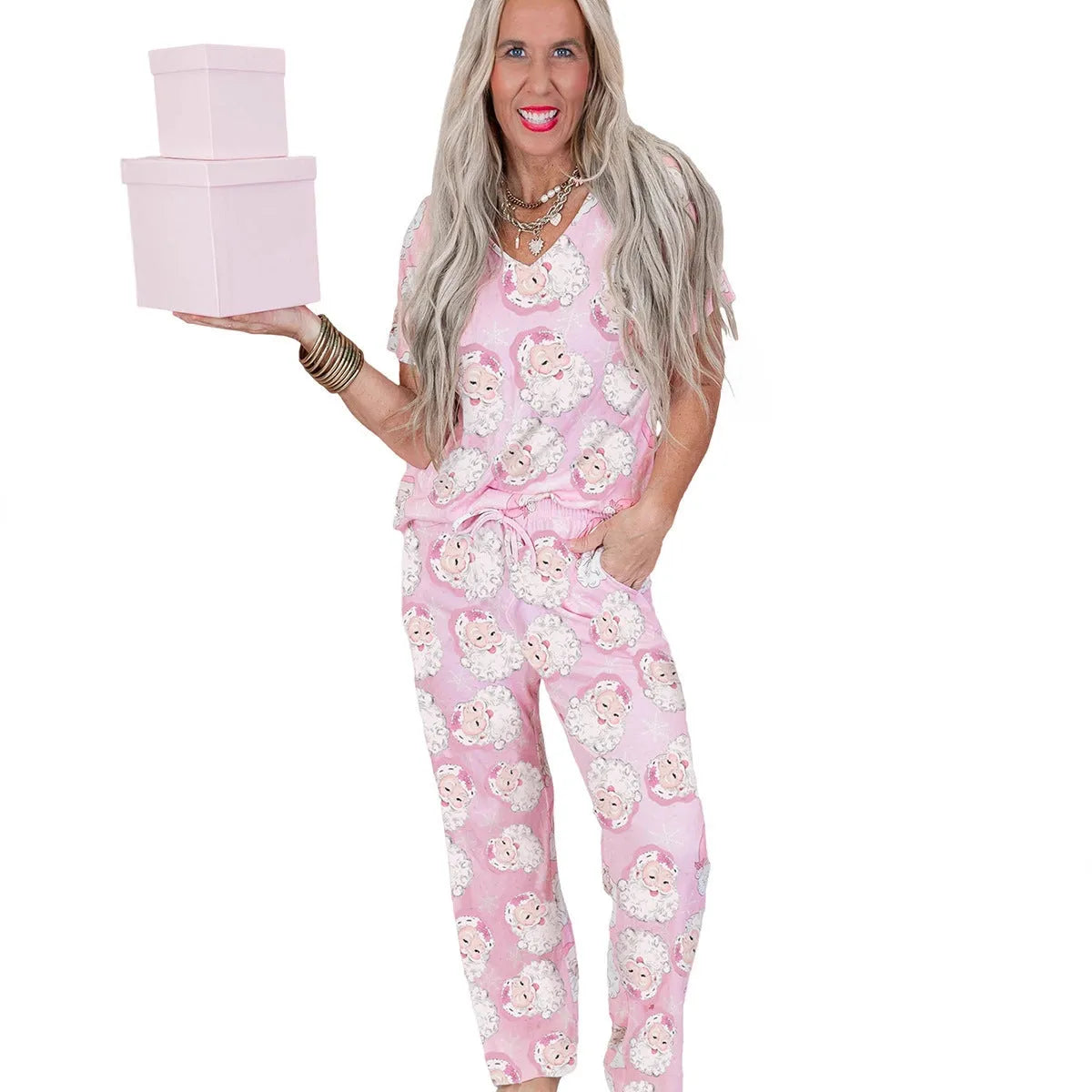 Women's pink Christmas print top and trousers set, short sleeve top, full length trousers, polyester, sizes S-XL.