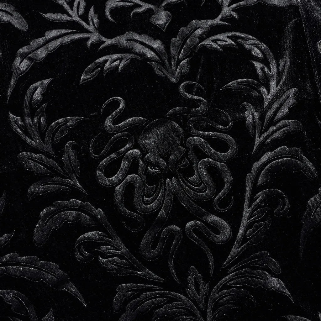 Black velvet men's shirt with pointed collar, long sleeves, and printed flocked Gothic preppy design detail.