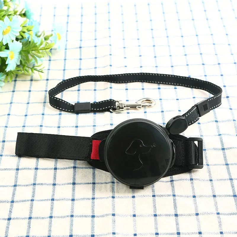 Automatic retractable dog leash showing pet holding hands design and 3 metre nylon cord
