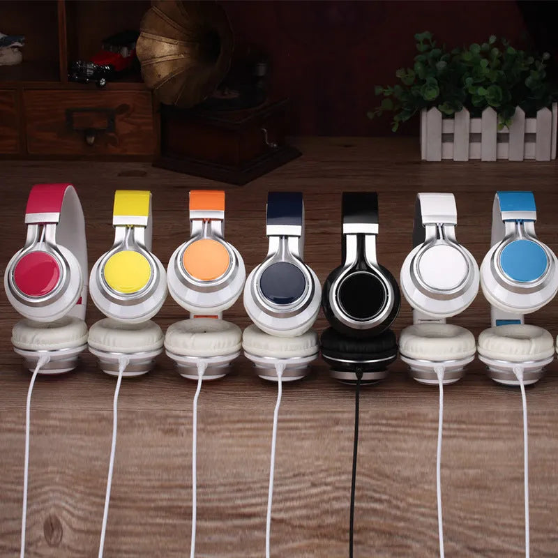 Wired head-mounted computer headset with 3.5mm plug, microphone, and 1.8m cable in seven colours