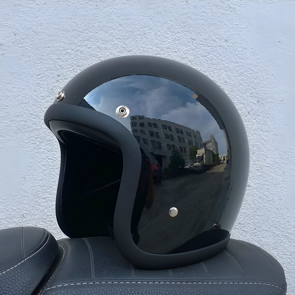 Retro-style glass fibre motorcycle half helmet shown in multiple colour options for adult commuters