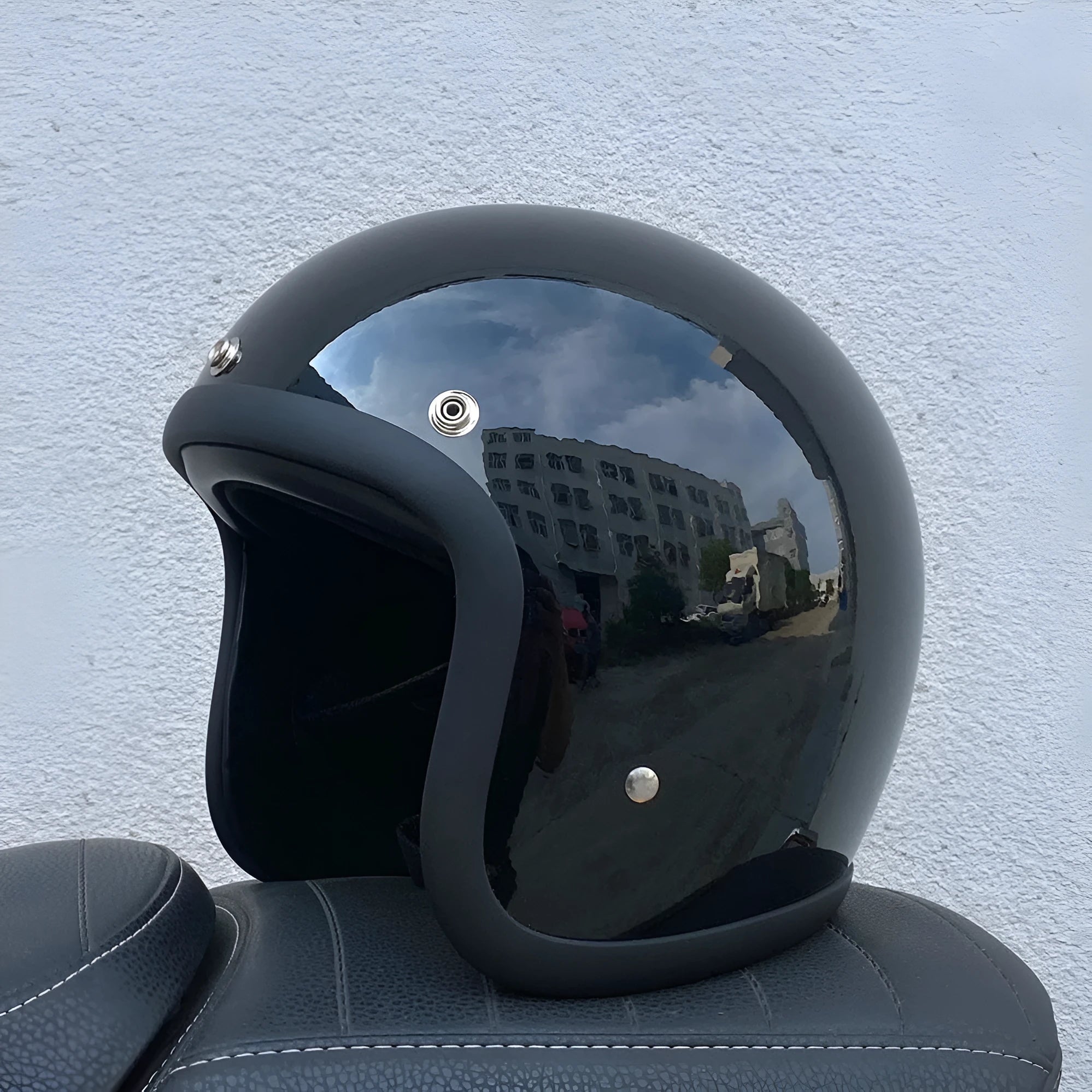 Retro-style glass fibre motorcycle half helmet shown in multiple colour options for adult commuters
