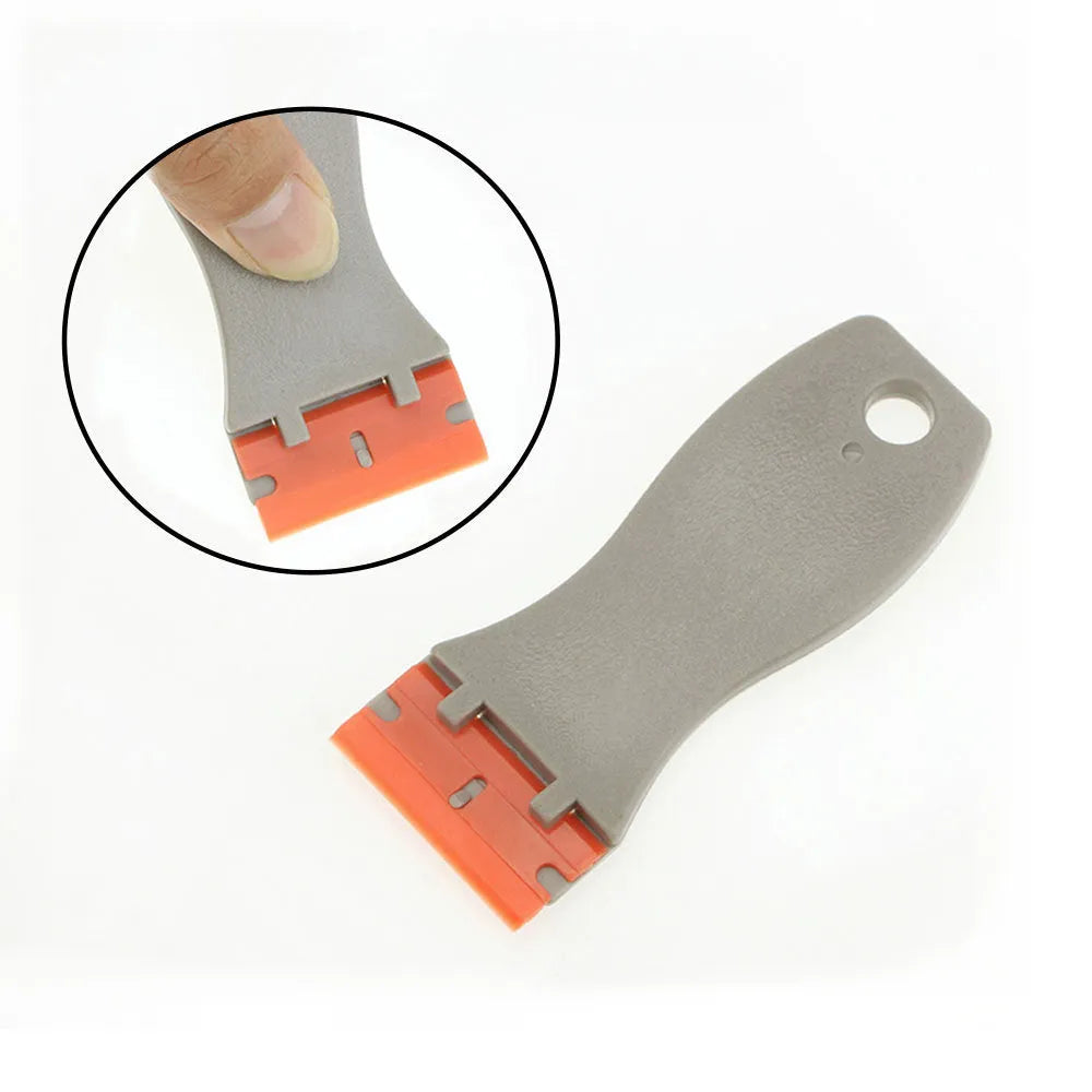 Car film glue removal scraper with stainless steel 40mm blade and grey plastic handle on white background