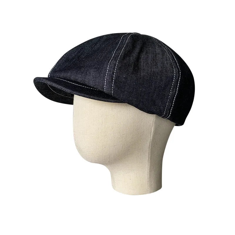 Black Japanese denim beret shown in unisex retro style with adult sizing options
