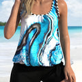 Blue tie-dyed women's swimsuit with floral split design and matching shorts in plus sizes