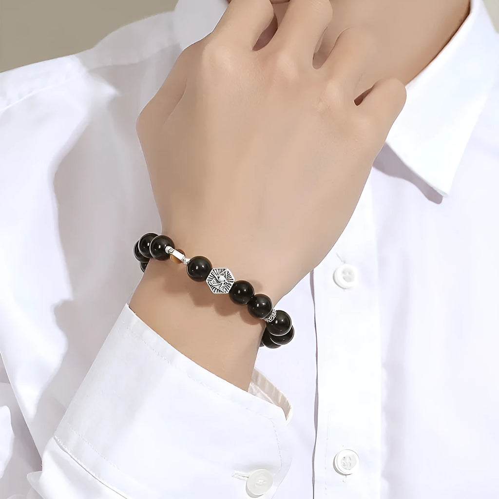 Men's retro-style S925 sterling silver bracelet with an inlaid 8mm God's Eye obsidian stone.