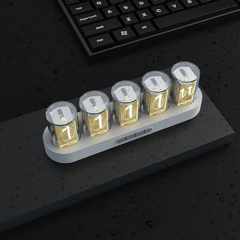 RGB LED digital tube clock showing time display with colourful lighting on a desk.