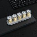 RGB LED digital tube clock showing time display with colourful lighting on a desk.
