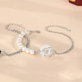 Close-up of a 925 sterling silver bracelet with a safe buckle, featuring obsidian pearls and a detailed snake charm in a new Chinese style.