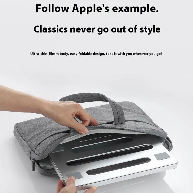 Super light aluminium alloy folding laptop cooling rack on a desk.