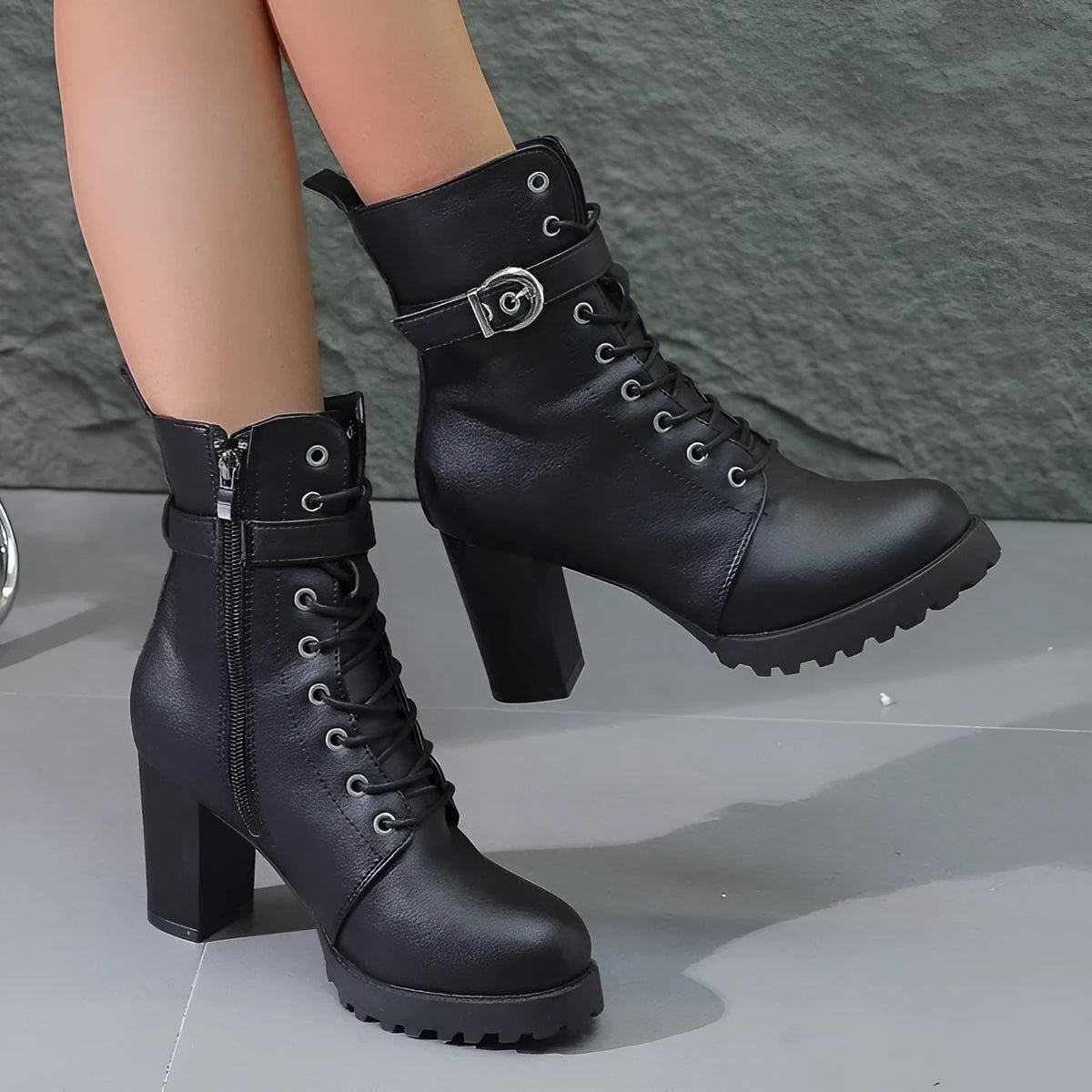 Women's plus size Martin ankle boots in black or dark brown with belt buckle, side zipper, and short stout heel, sizes 35-42