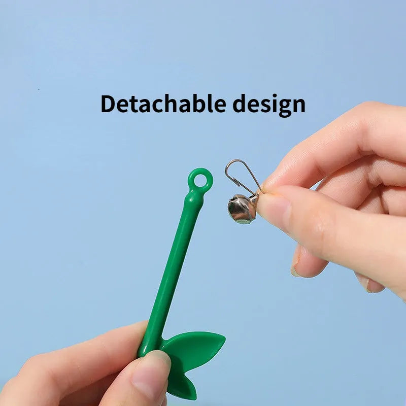 Green interactive cat feather wand toy with bell and feather attachments