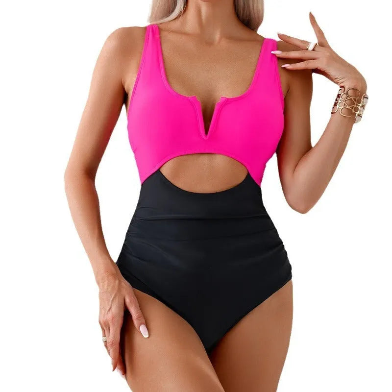 Women's one-piece swimsuit with colour-block design in nylon fabric.