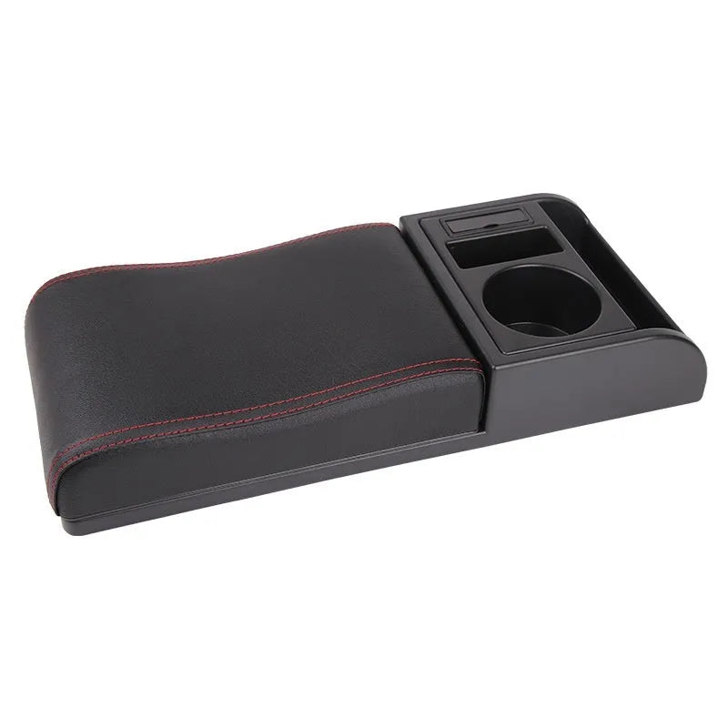 Universal car armrest cover in black with red decorative lines showing PU leather texture surface