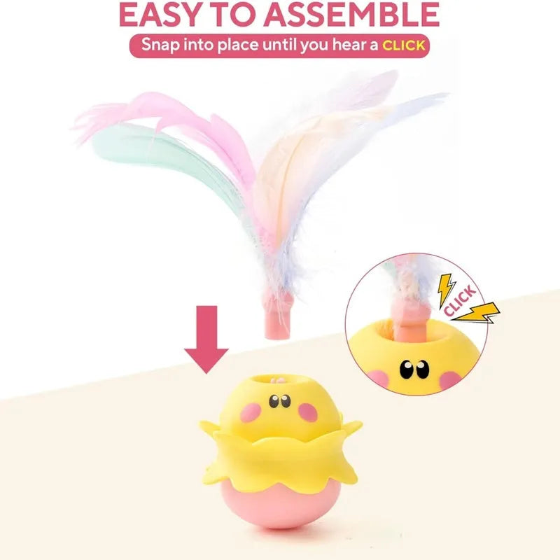 Pink interactive automatic cat feather toy with 360° rotation, LED light, and detachable feathers.