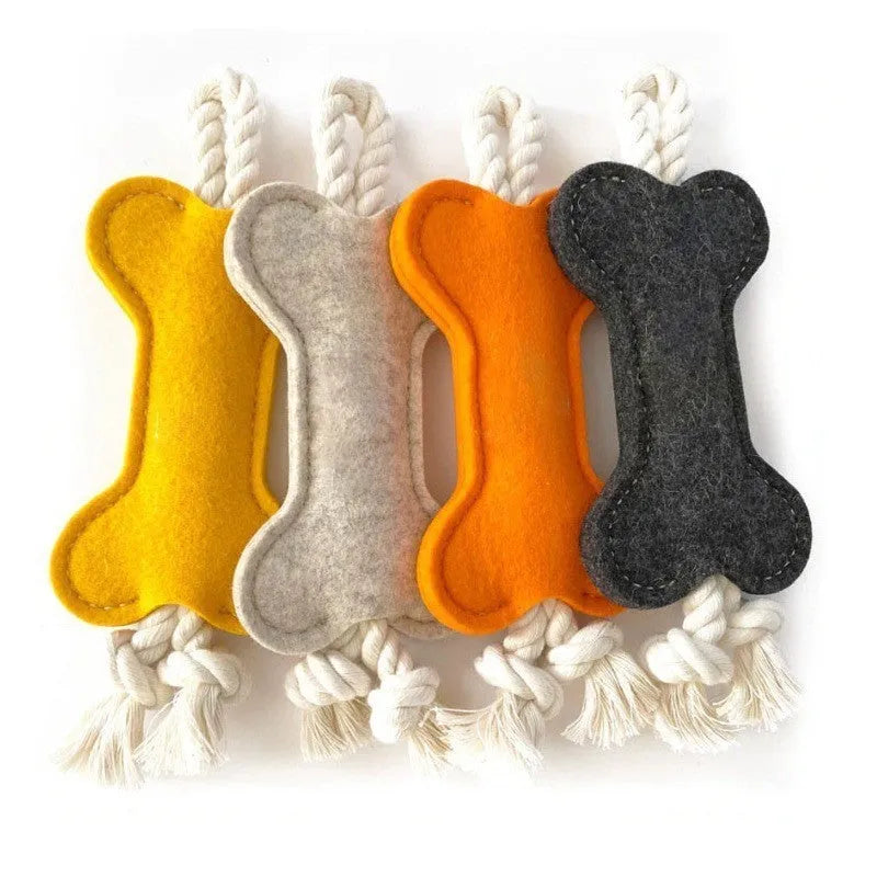Bone shaped dog toy with rope knot construction in four colour options for bite resistant training