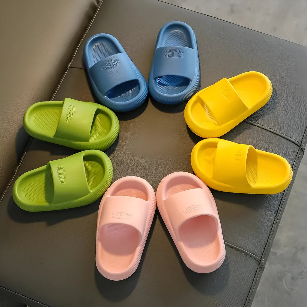 Colourful children's EVA slippers with a non-slip sole, shown in mixed colours on a white background.