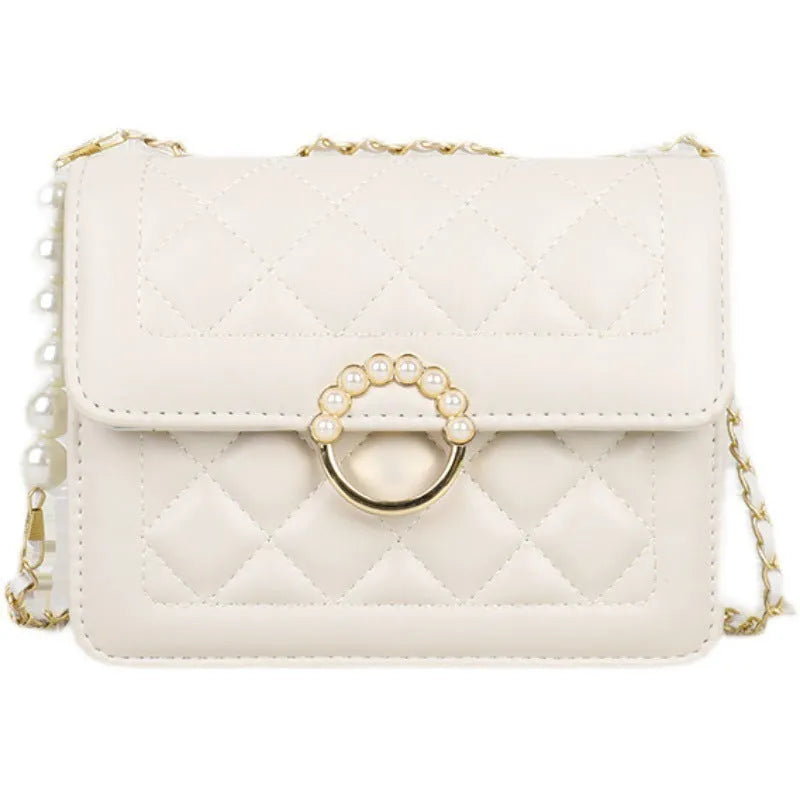 Diamond chain shoulder crossbody bag in soft PU with three-dimensional pocket design, shown in blue, black, beige and cream options