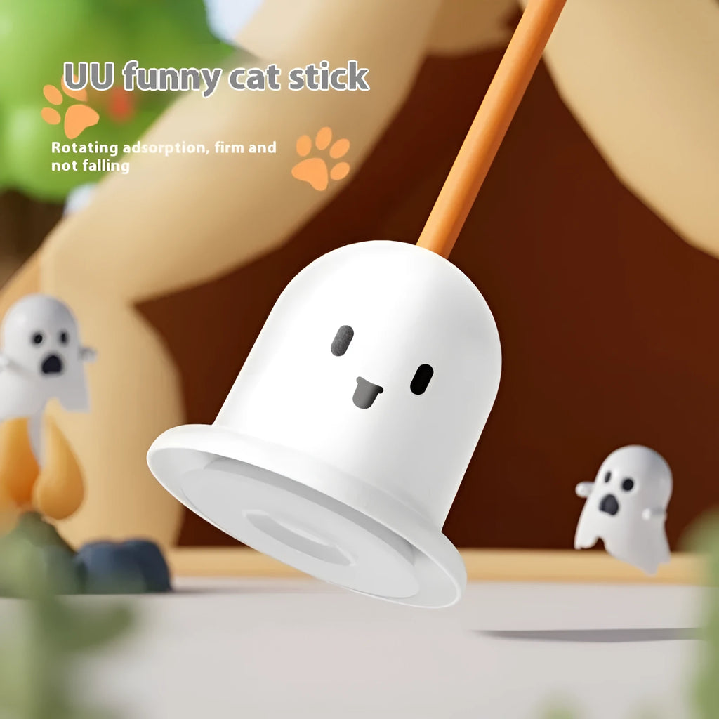 Cat toy strong suction cup cat teaser in green plastic with suction cup base on a smooth surface