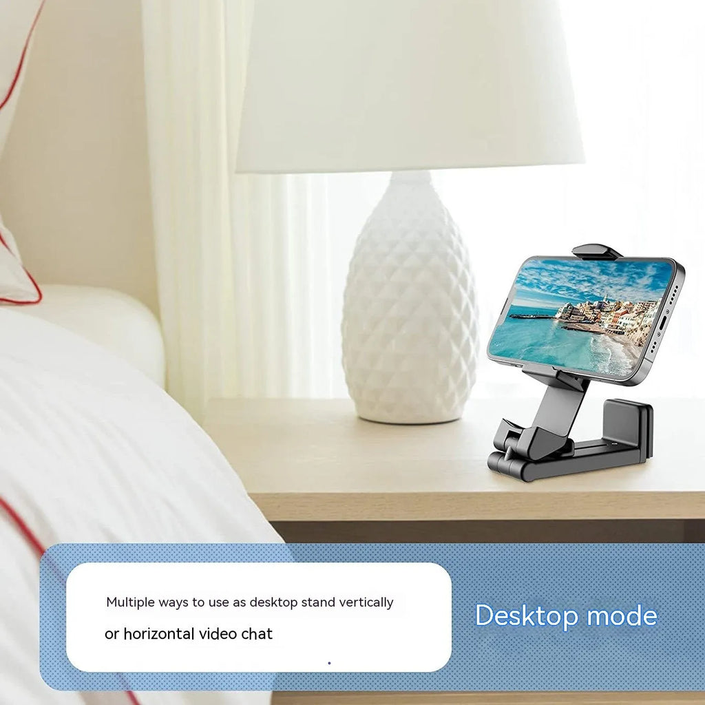 Foldable rotating phone holder in black, showing adjustable head and compact folded position.