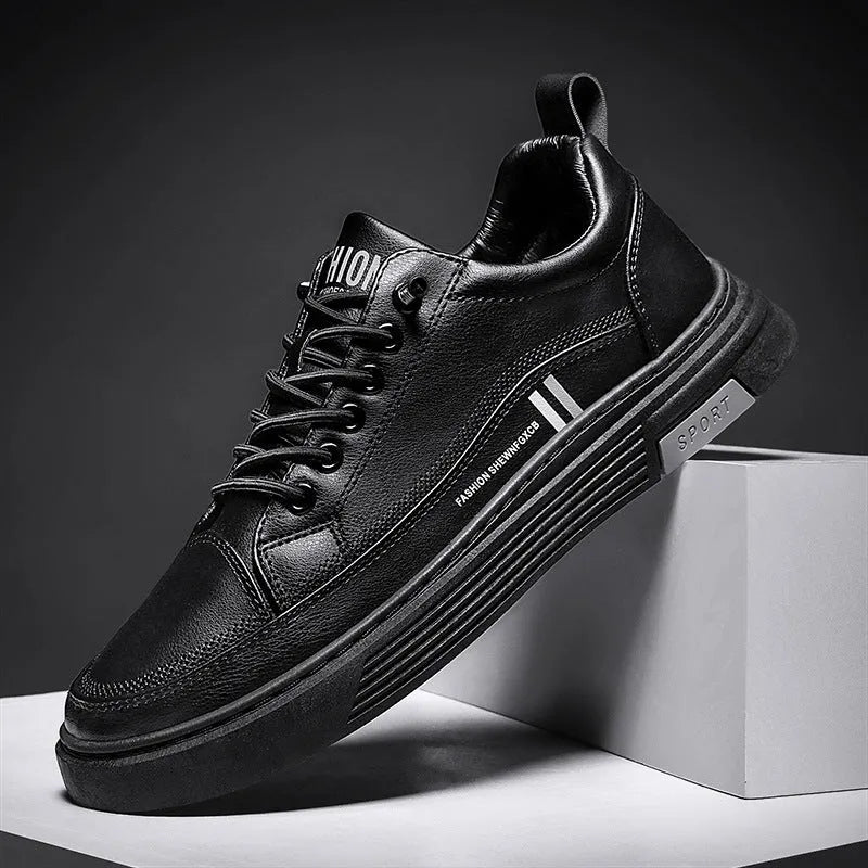 Men's black and white low-top skate shoes with elastic band and rubber sole
