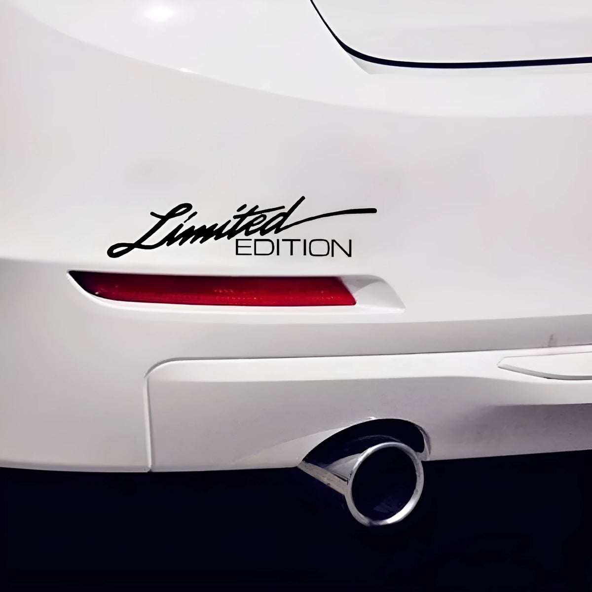 Reflective British style bumper sticker on plastic sheet, showing black, white, and colourful design options.