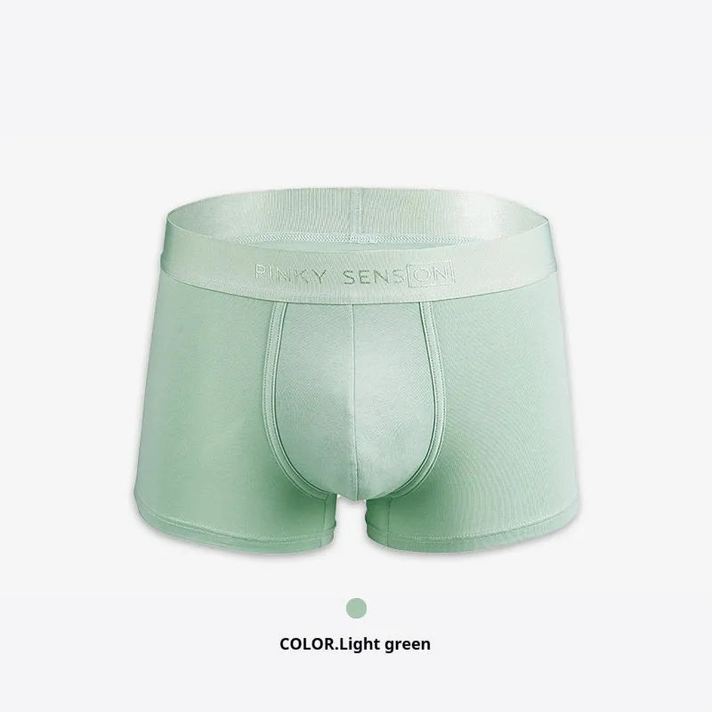 Men's solid colour cotton boxer shorts in black, white, silver grey and light green.