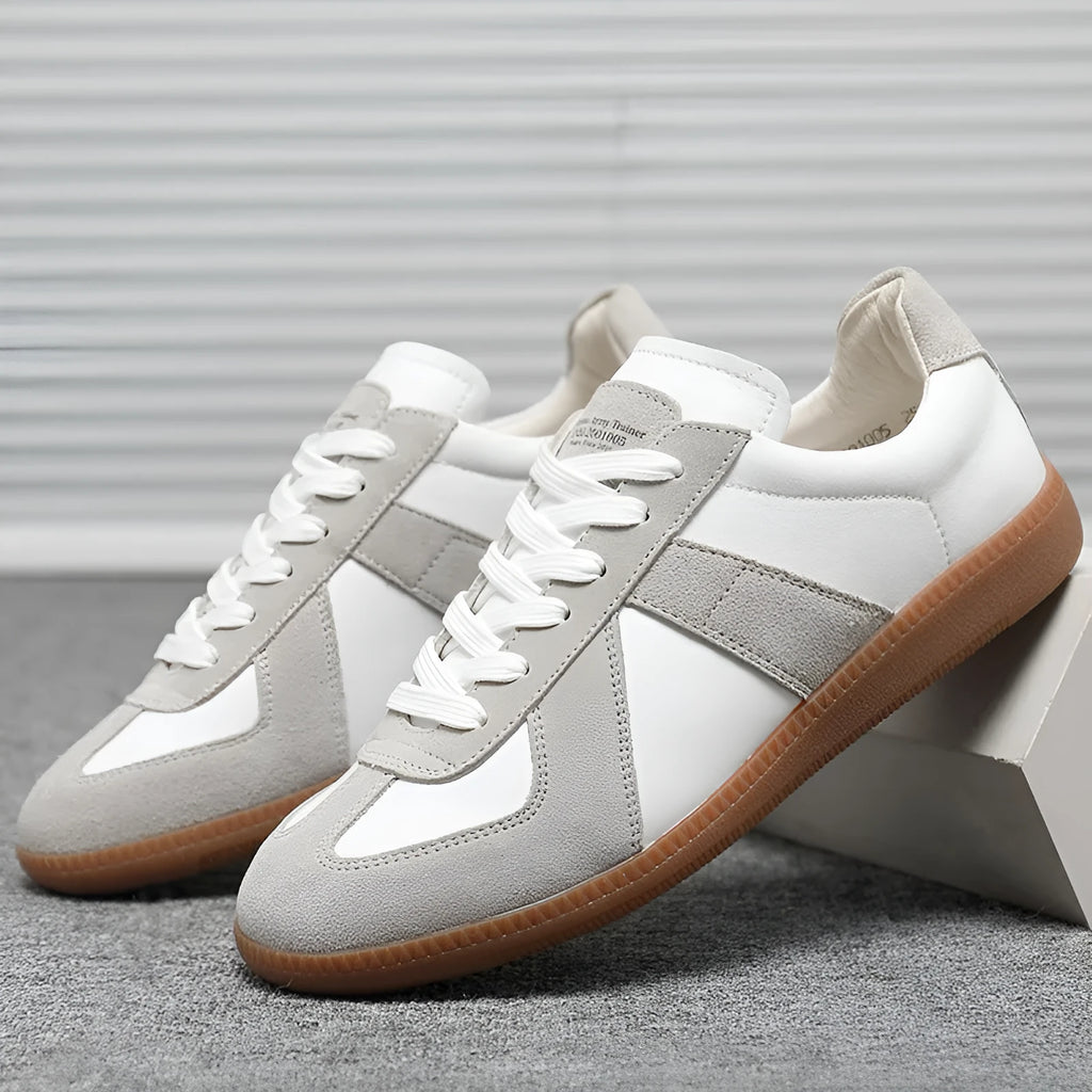 White Japanese-style retro low-top sneakers with matte upper and lace-up front