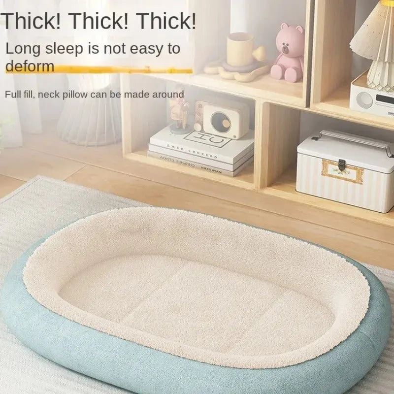 Thickened grey dog kennel for a small dog, with a sloped roof and a soft removable cushion inside.