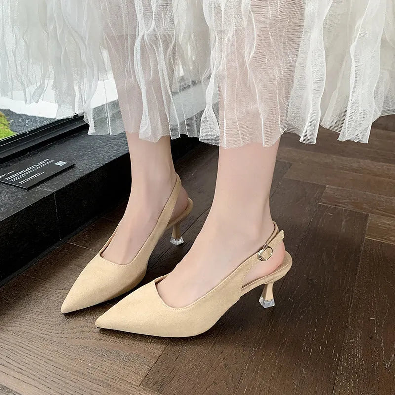 Women's apricot suede pointed-toe stiletto high heels on a neutral background.