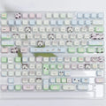 Colourful puppy character PBT key cap set for mechanical keyboards with 26 alphabetical characters.