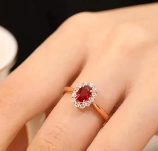Sterling silver ladies ring with gold pigeon design and red blood ruby gemstone