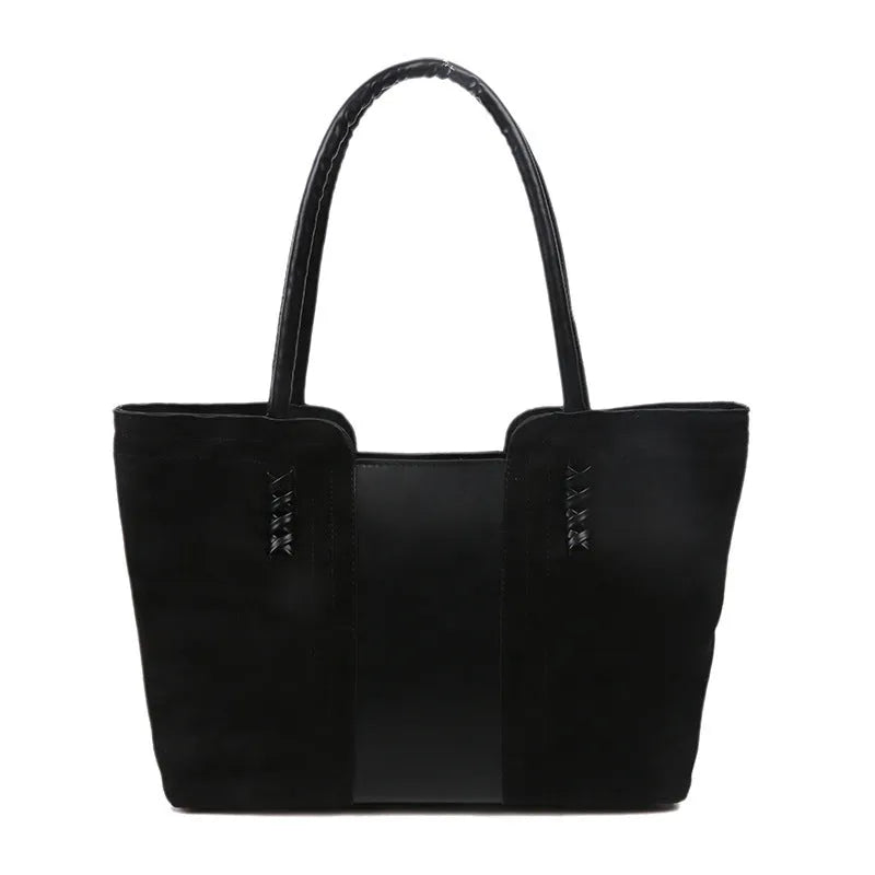 Women's large nylon tote bag in black with detachable shoulder strap, polyester lining, phone and document pockets