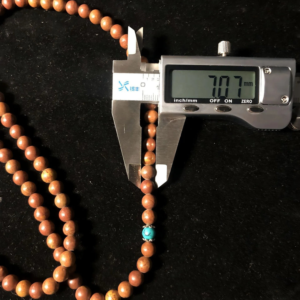 Handmade geometric stone bead bracelet with 108 polished Lvzhu beads