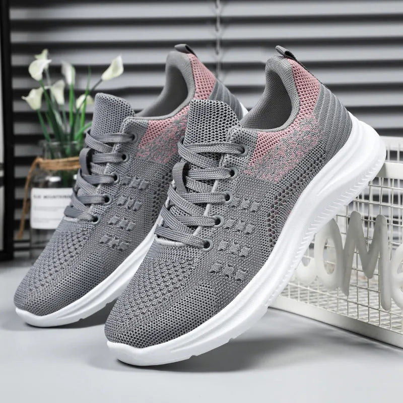 Women's lightweight mesh sneakers in black, grey or pink with round toe and lace-up front