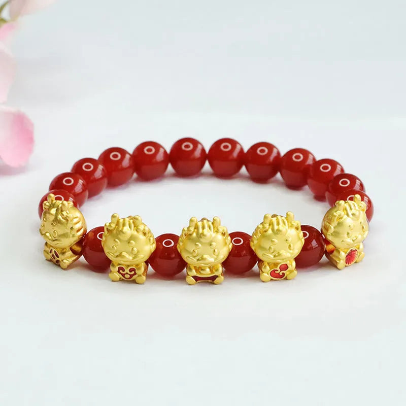 Red agate Five Blessing Dragon bracelet with 8mm beads on a wrist.
