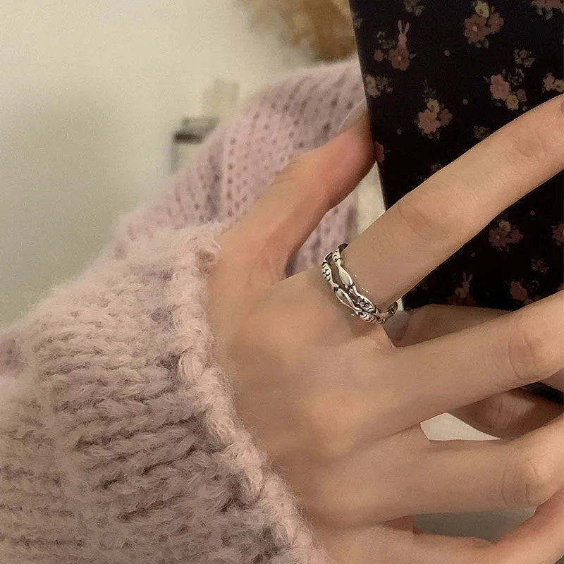 Women's adjustable copper fish ring in T020 white gold colour with electroplated finish and fish motif