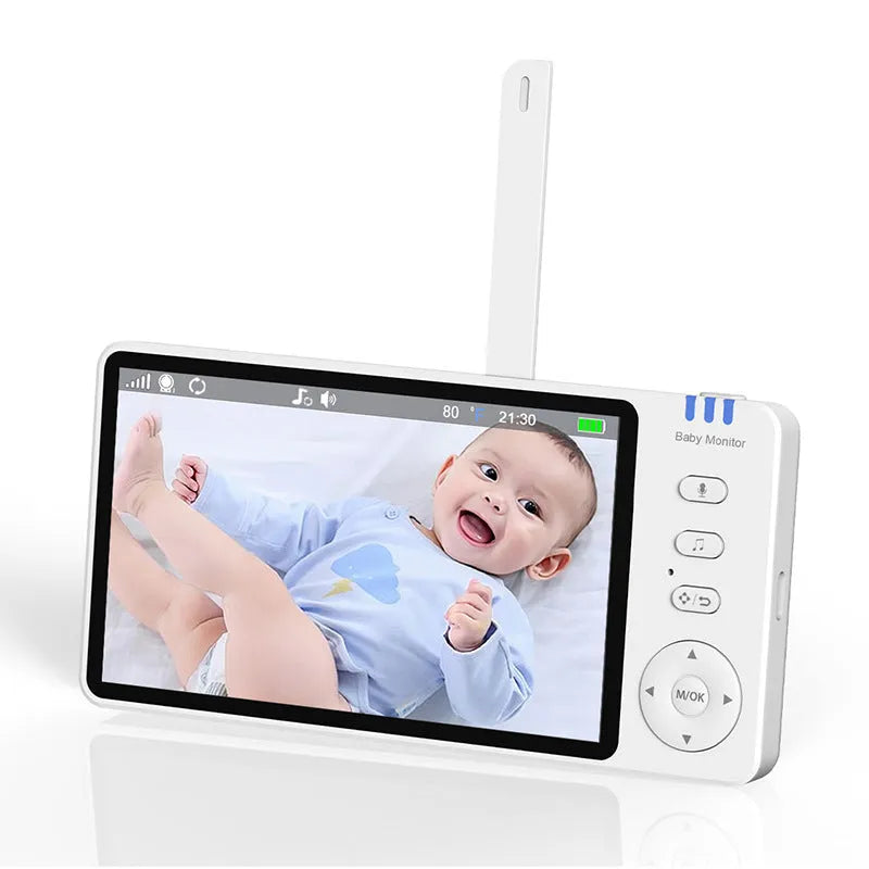 White ABM501 HD wireless baby monitor with 5-inch screen on a table.