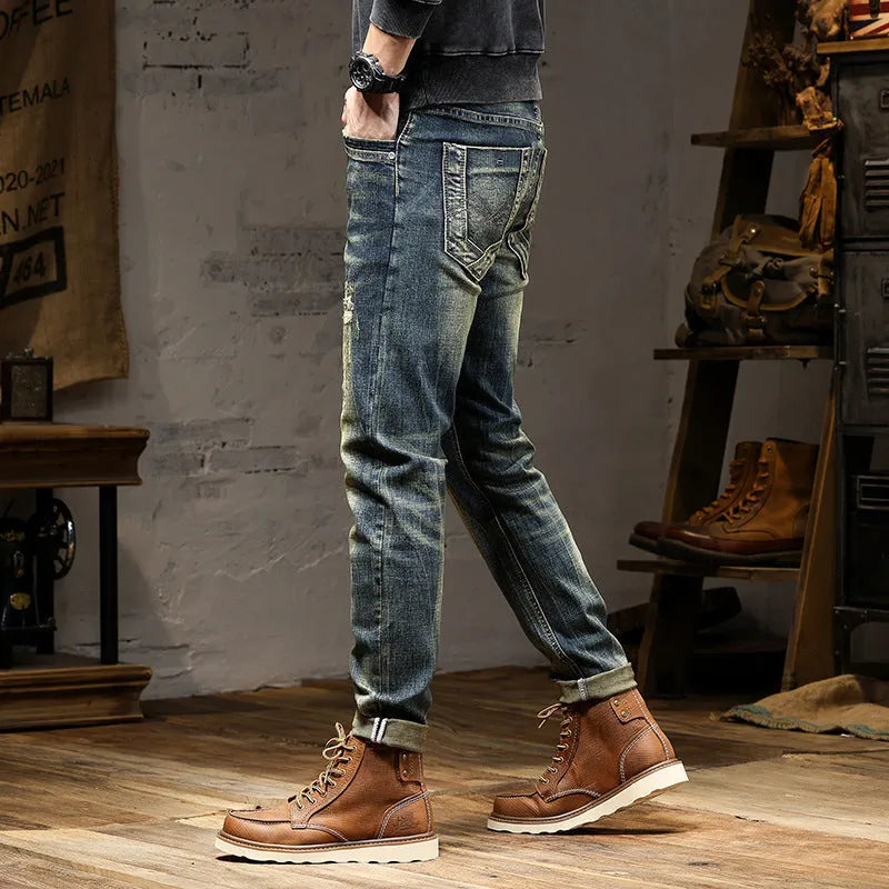 Man wearing retro coloured stretch cotton denim skinny fit jeans with a zip fly.