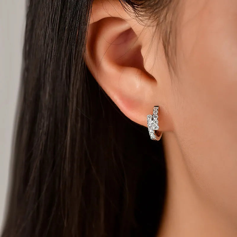 Small diamond ear clip earrings in white gold colour copper with geometric ring design, one pair
