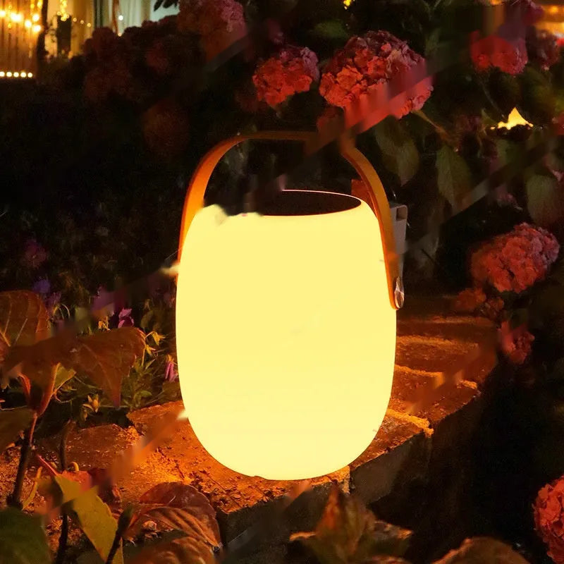White plastic solar garden ambience light with IP65 rating, USB charging, shown in 18x27cm and 21x31cm sizes