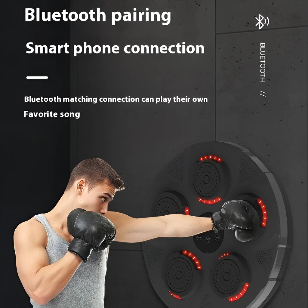 Wall-mounted smart boxing trainer sandbag in black with LED lights on a white wall.