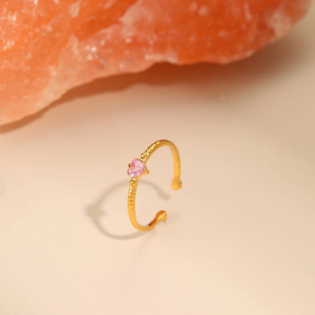 Open mouth geometric ring with a love heart shape and inlaid zircon, in stainless steel.