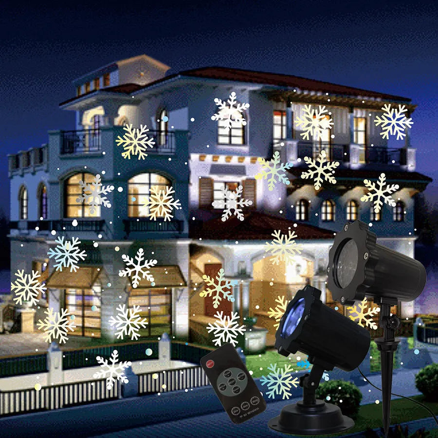 LED Christmas snowflake laser projector with white moving patterns on a dark garden wall at night