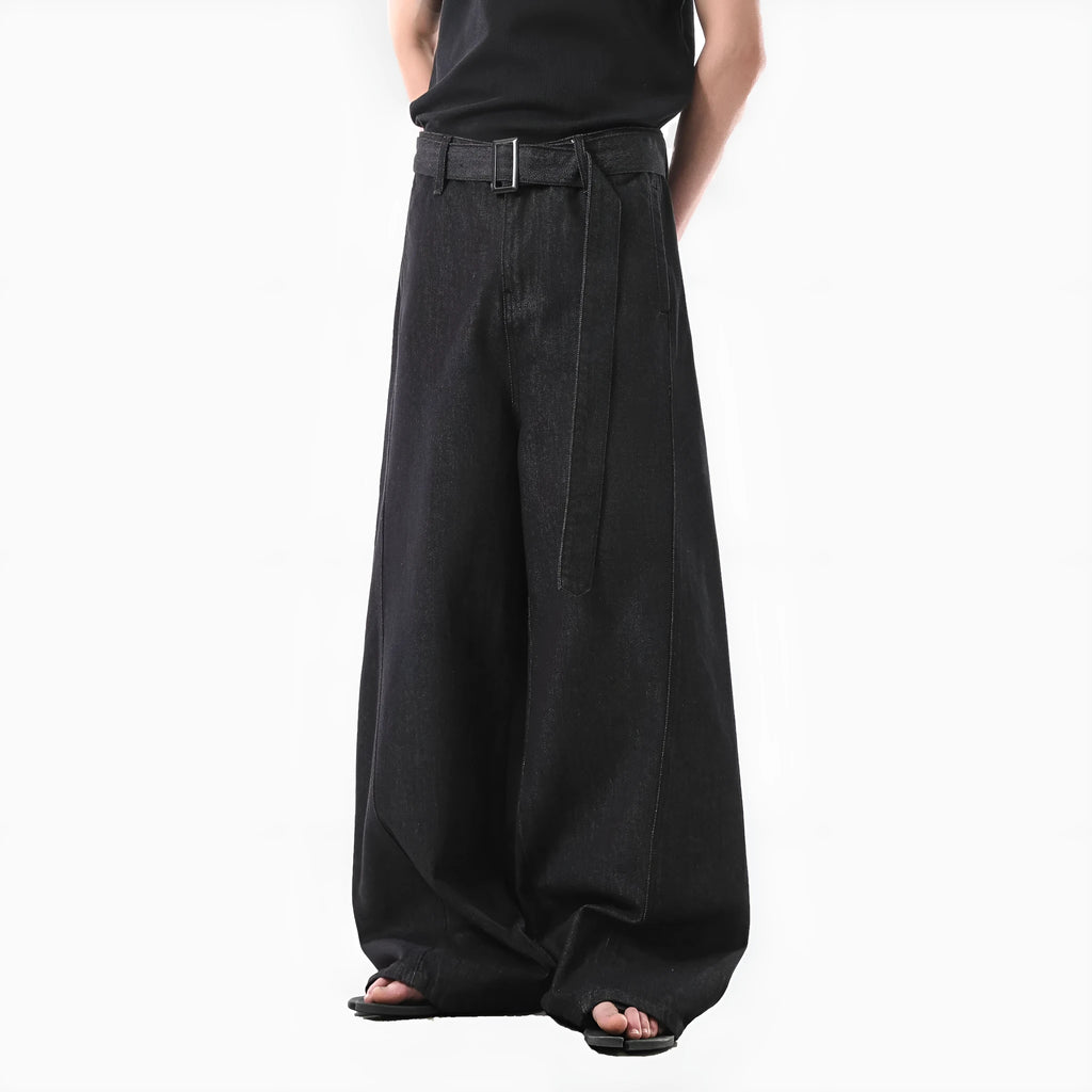 Black women's high waist straight leg jeans with gold detailing on a mannequin, showing the zip fly and classic denim cut.