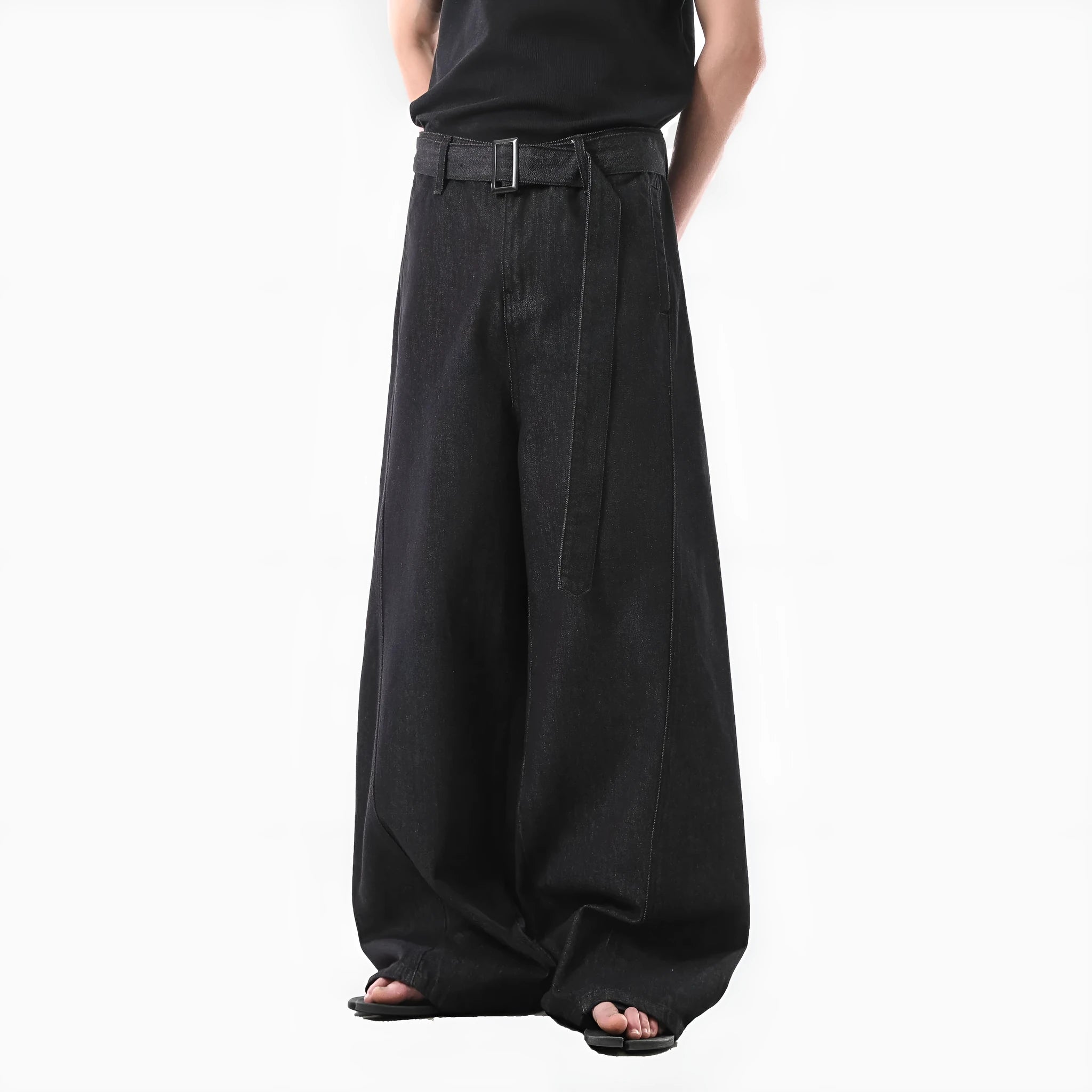 Black women's high waist straight leg jeans with gold detailing on a mannequin, showing the zip fly and classic denim cut.