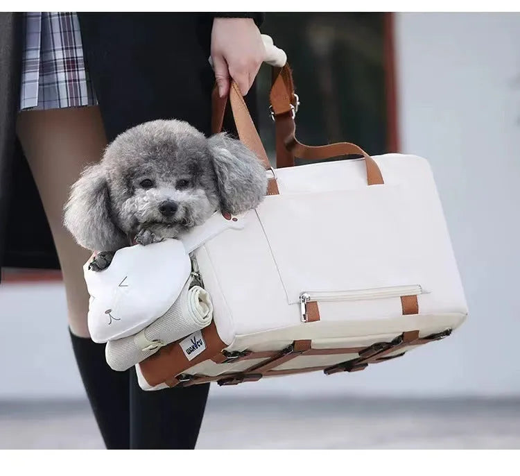 Beige hard-shell pet flight case with one-shoulder carry strap and EPE padded interior
