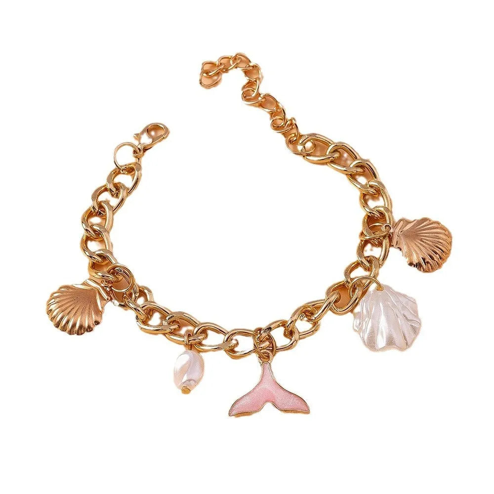 Women's shell pearl mermaid tail bracelet in white pearl alloy finish