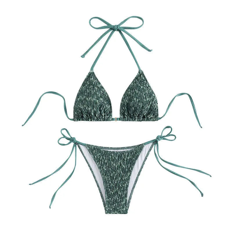 Women's green halter backless swimsuit with three-point design showing front and back styling