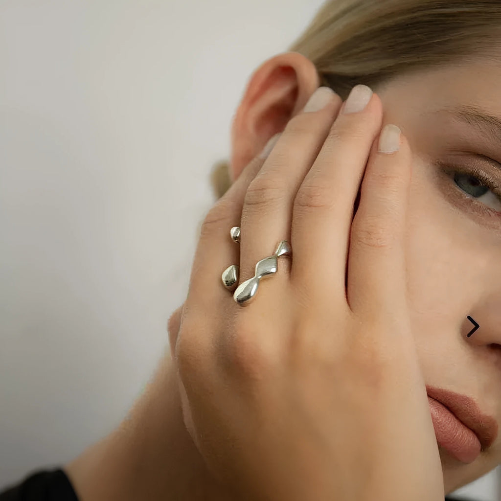 Brass opening ring with spherical design in gold or silver colour for women